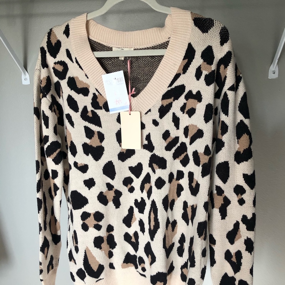 Cheetah boutique crew neck sweater